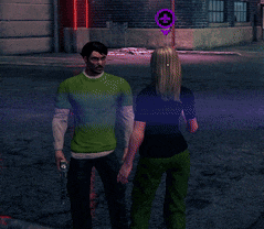 a man in a green shirt is kissing a woman