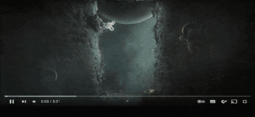 a group of jellyfish are swimming in a cave