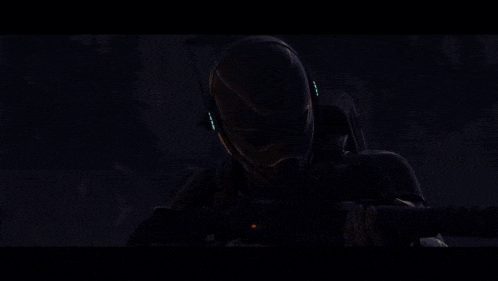 a man wearing a pair of goggles with a red light on the lenses