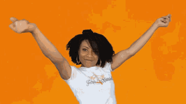 a woman wearing a white shirt that says join nation on it
