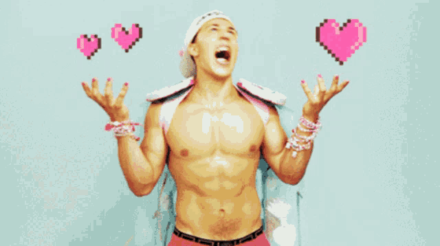 a shirtless man with pink hearts in the background