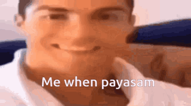 a close up of a man 's face with the words " me when payasam " written on the bottom