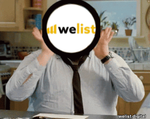 a man covering his face with a circle that says " all welist "