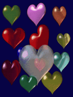a bunch of different colored hearts are on a dark blue background