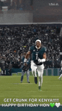 a football player is running on a field with the caption `` get crunk for kenya '' .
