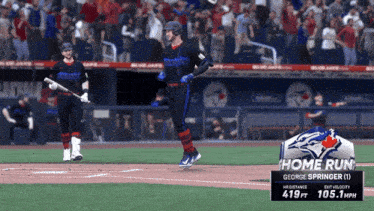 a blue jays player named george springer is running to home plate