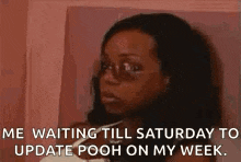 a woman wearing sunglasses is waiting till saturday to update pooh on my week .