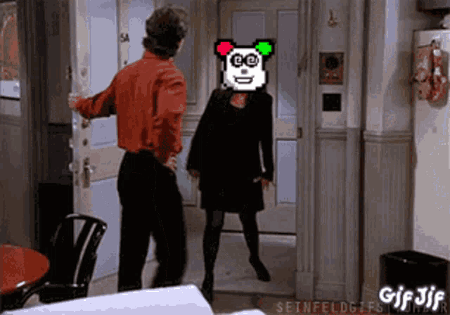 a man in a red shirt is opening a door to a woman in a black dress with a panda face on her head