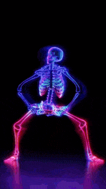 a colorful skeleton is dancing in a dark room .