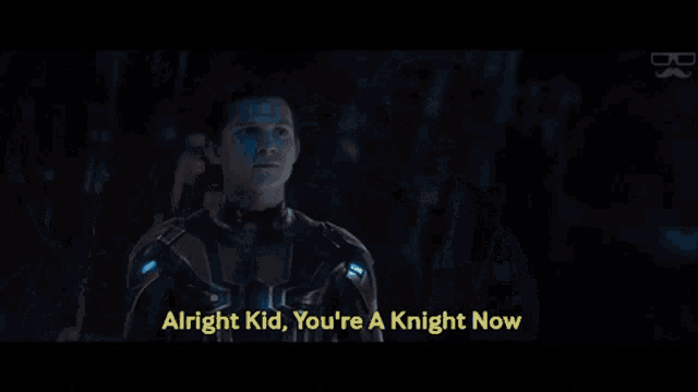 a man talking to another man with the words alright kid you 're a knight now on the bottom