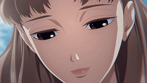 a close up of a girl 's face with a tear on her nose