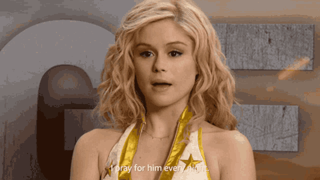 a woman says " i pray for him every night " in a video