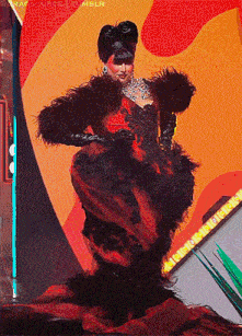 a woman in a red and black dress is standing on a stage with the word tumblr on the bottom