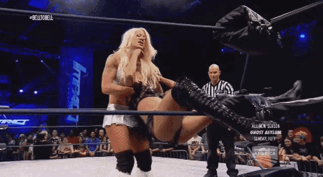 two women in a wrestling ring with the word belltobell on the top