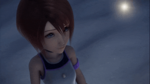 a girl with a headset around her neck is standing in the dark