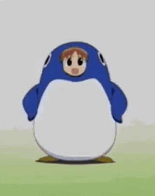 a blurred image of a cartoon character sitting on the floor .