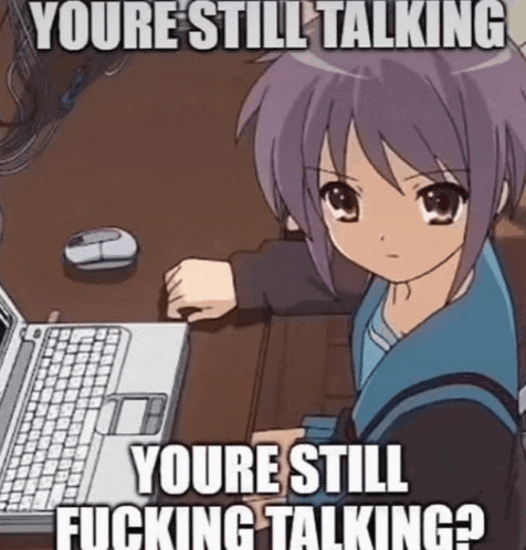 a picture of a girl sitting in front of a laptop with the caption " youre still talking youre still fucking talking ? "