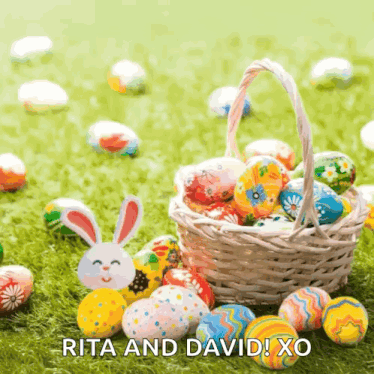 a basket filled with colorful easter eggs and a bunny on the grass