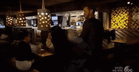 a blurred image of a person in a room with the words when we rise abc on the bottom