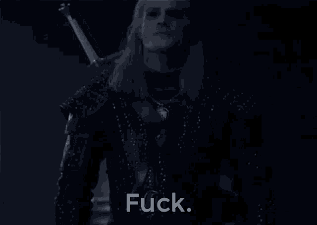 a man with a sword in his hand says fuck