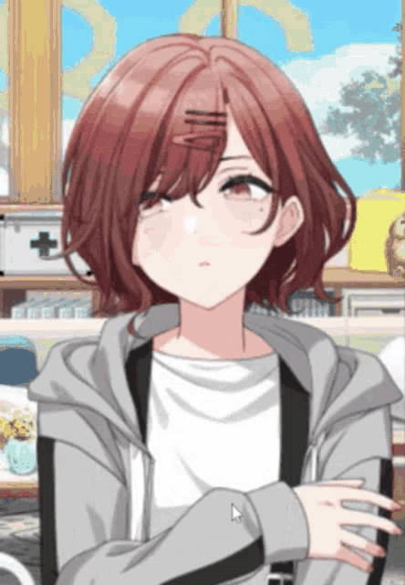 a girl with red hair is wearing a grey jacket and white shirt