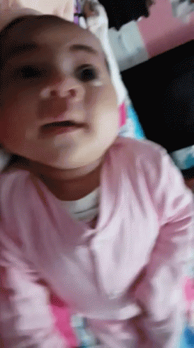 Baby Stare GIF - Baby Stare Laying In Bed GIFs