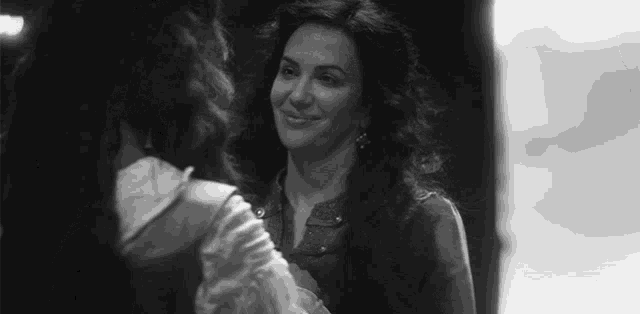 a black and white photo of two women with the word netflix on the bottom right