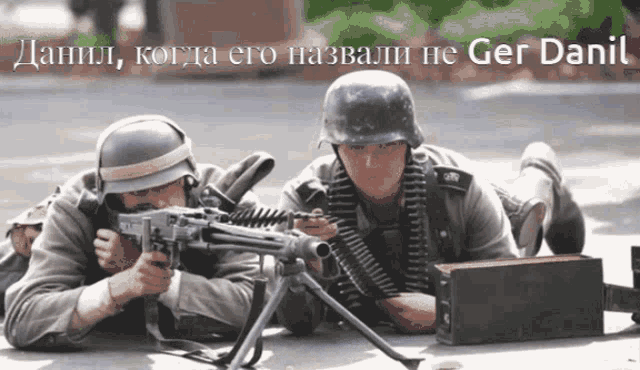 two german soldiers are laying on the ground with their guns and a caption that says ger daniel
