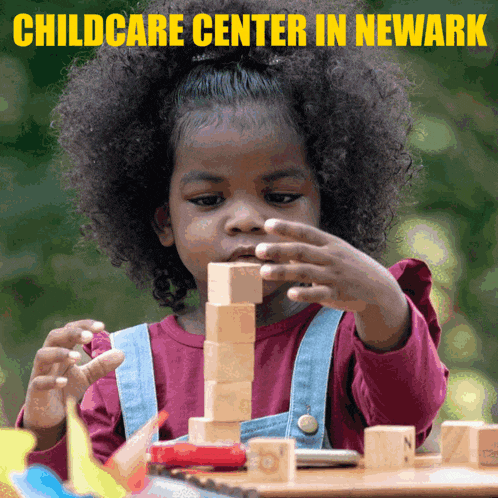 a child playing with wooden blocks with the words childcare center in newark behind her