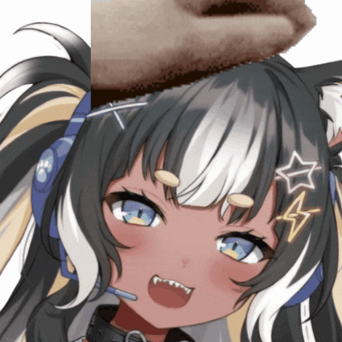a close up of a girl with headphones and a star on her forehead