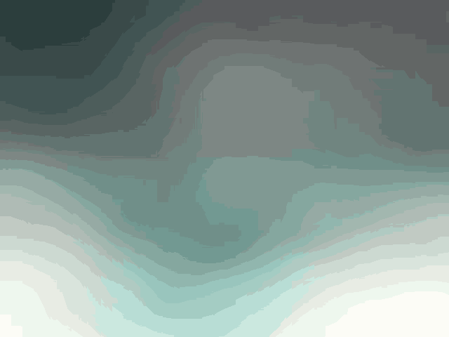 a blurred image of a green and white background with a gradient .
