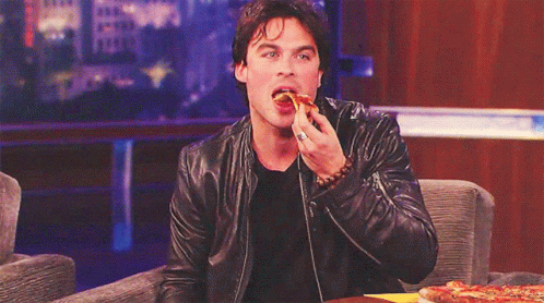Eating Pizza Damon Salvatore GIF - Eating Pizza Damon Salvatore The Vampire Diaries GIFs