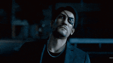 a man smoking a cigarette with a snake on his eye
