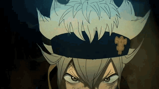 a close up of a cartoon character 's face with horns and a badge that says ' a ' on it