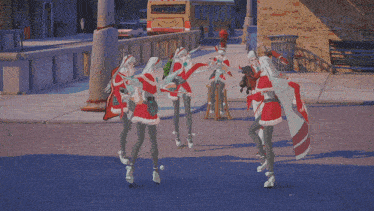a group of people dressed in santa costumes are dancing on a sidewalk