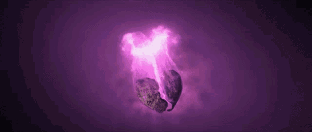 a purple light coming out of a hole in the ground .