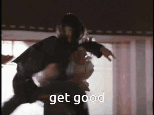 a man is carrying another man in his arms and the words get good are visible