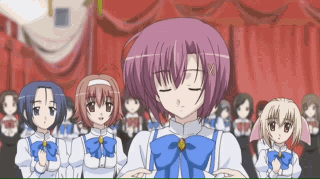 a girl with purple hair is standing in front of a crowd