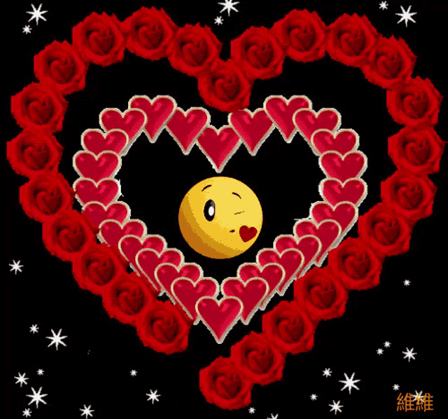 a heart made of red roses and hearts with a smiley face in it