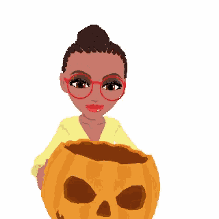 a girl is holding a pumpkin and a stuffed monster on top of it .