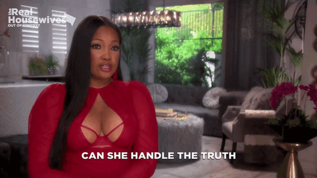 a woman in a red dress with the words can she handle the truth above her
