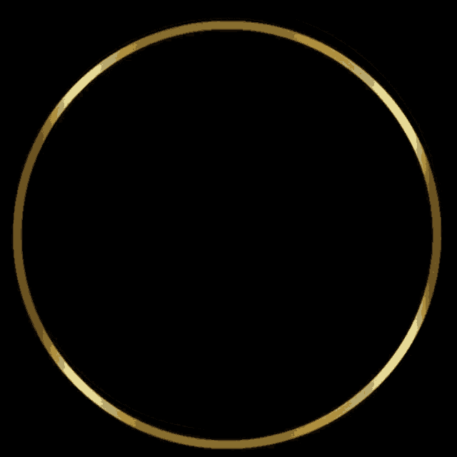 a gold circle on a black background with a black background