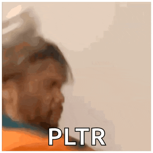 a blurry picture of a man 's face with the words pltr written on it
