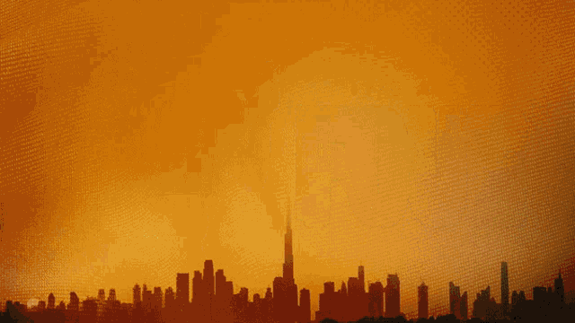 a purple and blue background with a silhouette of a city in the foreground