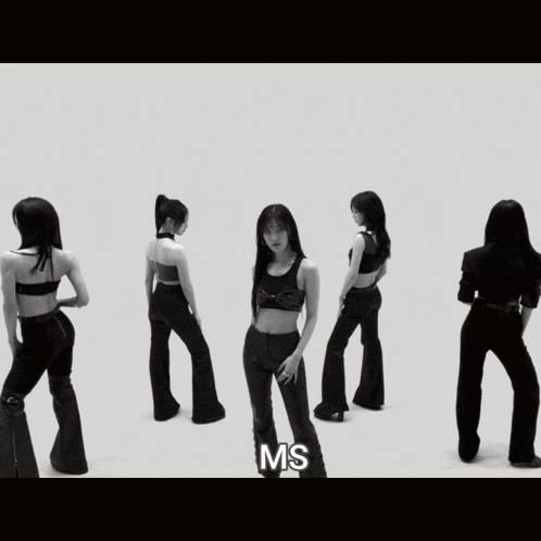 a black and white photo of a group of women with the letters ms on the bottom right