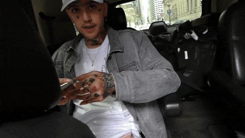 a man with a tattoo on his arm that says ' i love you '