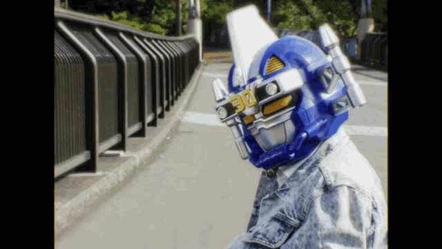 a person wearing a helmet that says 30 on it