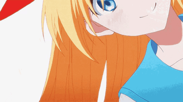 a close up of a girl with long blonde hair