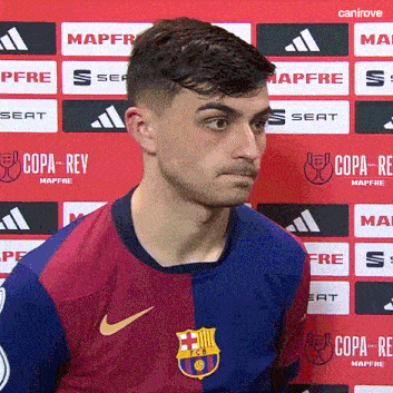 a man wearing a nike shirt with the fcb logo