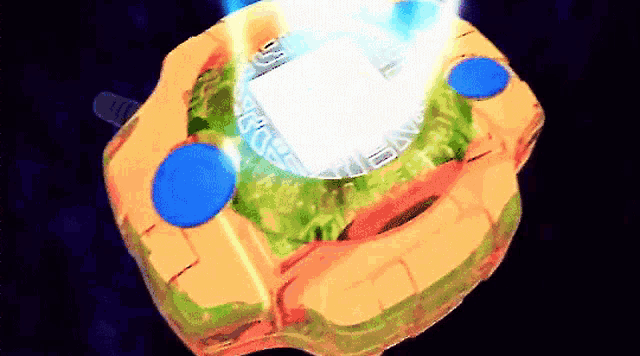 a green and orange object with a blue button on the bottom